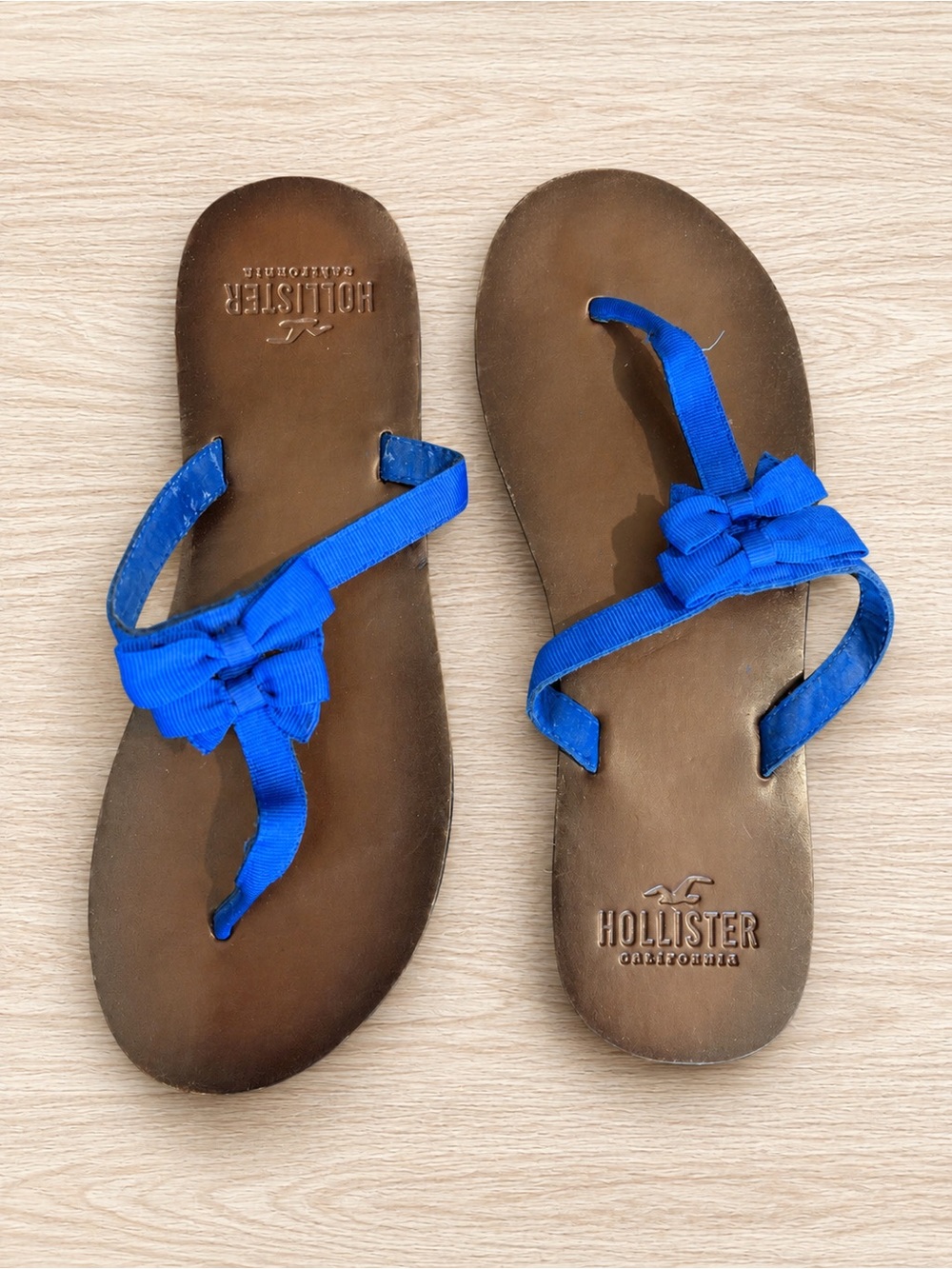 Hollister Brown Leather Flip Flops with Bright Blue Bow Straps